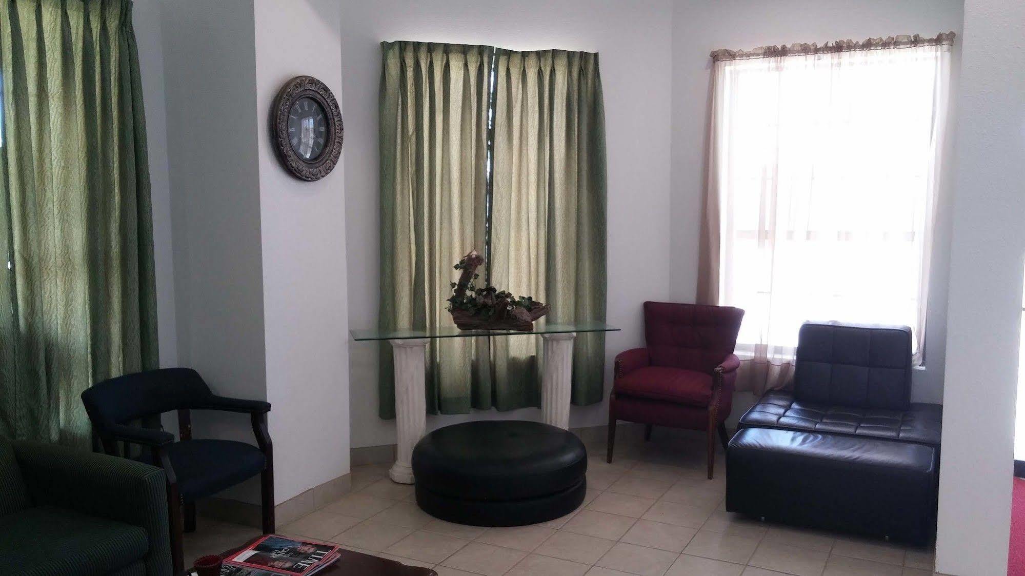 Country Regency Inn & Suites Manvel Luaran gambar