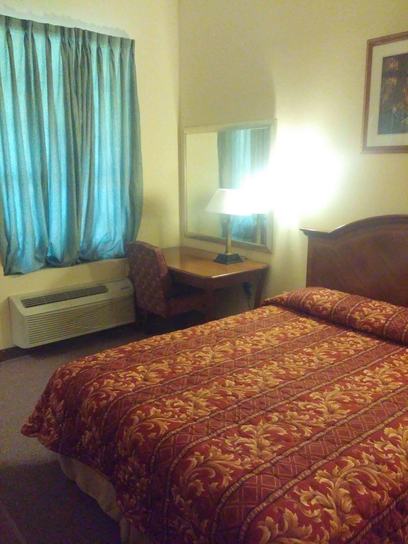 Country Regency Inn & Suites Manvel Luaran gambar