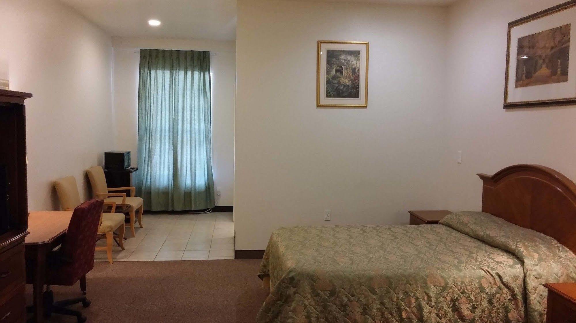 Country Regency Inn & Suites Manvel Luaran gambar