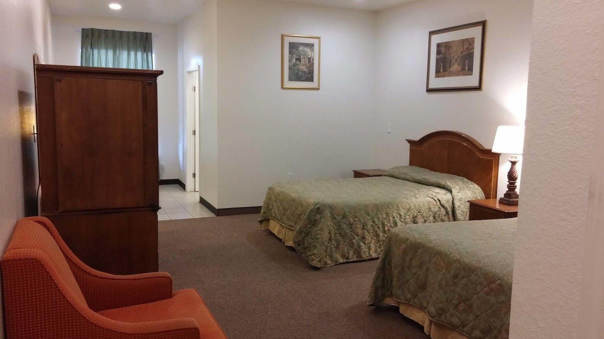 Country Regency Inn & Suites Manvel Luaran gambar
