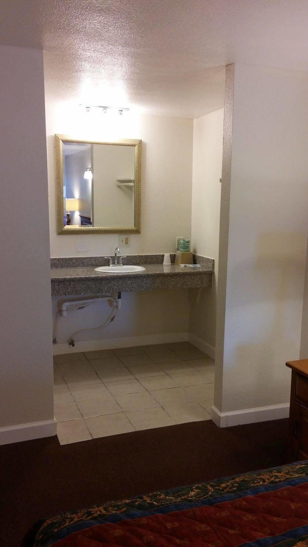 Country Regency Inn & Suites Manvel Luaran gambar